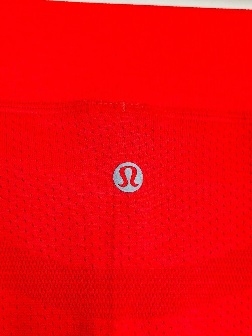 Lululemon lightweight high rise tennis skirt in tomato red orange. Size 2